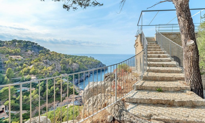 Deia Apartment | Deia tower overlooking the sea and it famous cove.