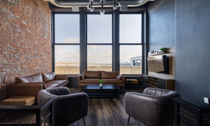West Main Historic District Condo | DerbyCity Plush Loft. Gather in Style by Hollyhock