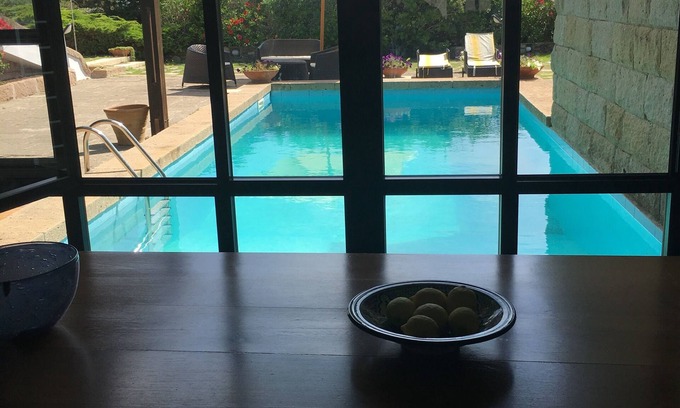 La Pelosa Villa | Design villa with a green roof a few steps from the sea