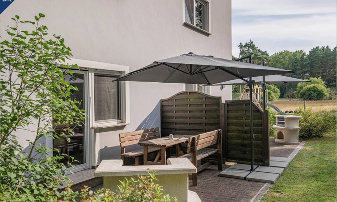 Garz Apartment | DHH Emily - Cozy semi-detached house with terrace and barrel sauna