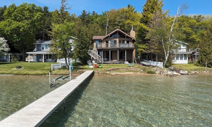 Beulah House | Direct Crystal Lake sandy swimming home. Kayaks, dock, firepit, AC Dog ok