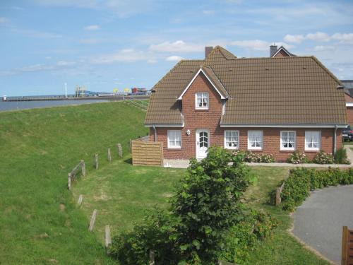 Dagebuell Apartment | Direkt am Deich - Ferienwohnung Amrum im Gästehaus Am Badedeich