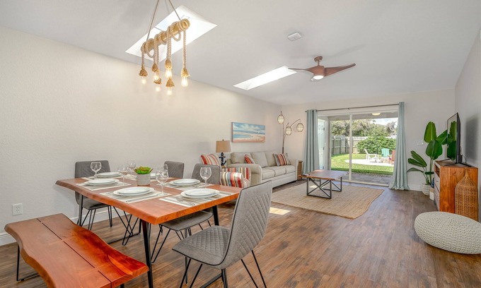 New Smyrna Beach House | Dog Friendly Home w/Private Fenced Yard, Garage & Fire Pit. STEPS to the Beach!