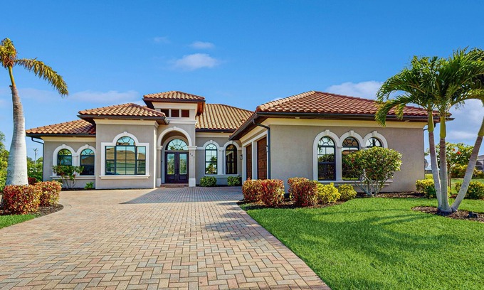 Pelican House | Dog-friendly home on the canal with AC & pool with spa - snowbird-friendly