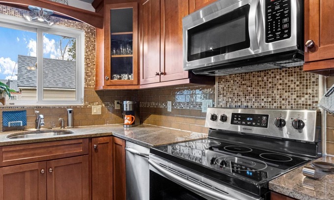 North End House | Dog Friendly North End Cottage with 2 Bikes & Lovely Back Deck! +Off-street Parking in Garage!