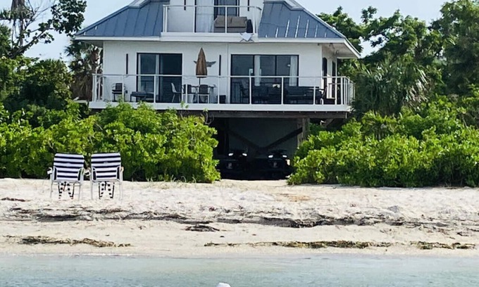 North Captiva House | Dolphin Cottage: Beachfront Home with Stunning Views & Private Beach