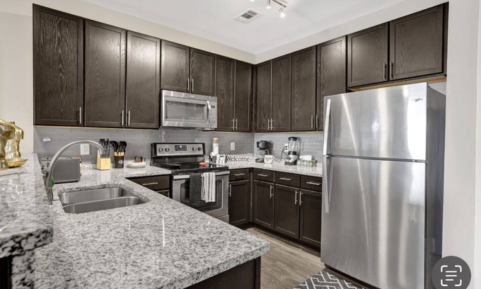 Five Points South Apartment | Downtown apartment with free gate parking