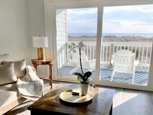 Carolina Beach Apartment | Driftwood Cottage - First floor OCEANFRONT beach retreat! Exceptional views, location and privacy condo