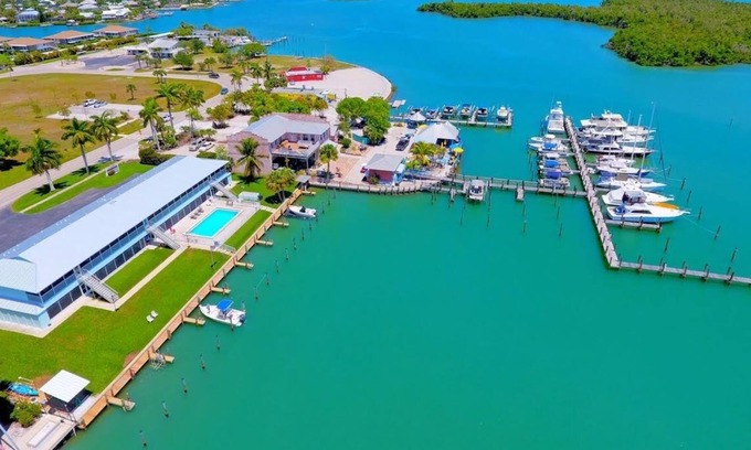 Isles of Capri Condo | Driftwood Landing (1-Bedroom Condo) with Pool by RedAwning