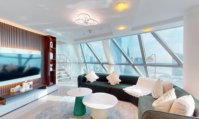 Trade Center Apartment | Duplex 2-bedroom apartment with its unparalleled retail, entertainment