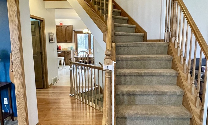 Oshkosh House | EAA Home - Quiet & Convenient - 2.7mi to EAA w/wooded backyard