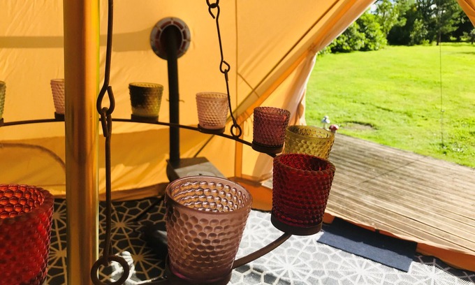 Guisborough RV Rental | Eclipse, a furnished canvas bell tent in field and woodland surroundings