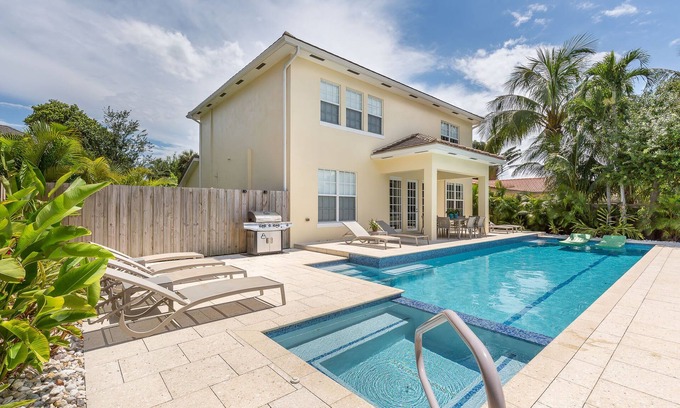Wilton Manors House | Eco-friendly 100% solar home with 42 ft salt water, lap pool/spa on new river