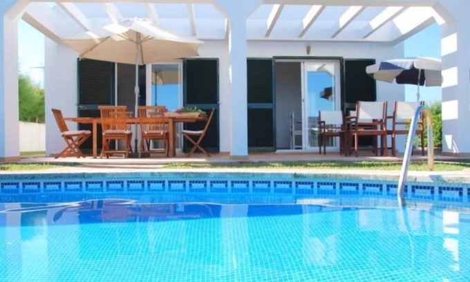 Cap d'Artrutx House | El Charrito. House with garden and pool overlooking the sea