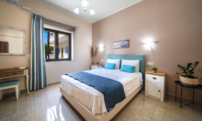 Nea Chora Apartment | Elegant, bright residense w/ ample garden, steps from sandy beach & Chania town