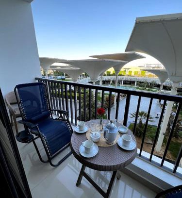 New Cairo Apartment | Elegant duplex with pool frontAUC