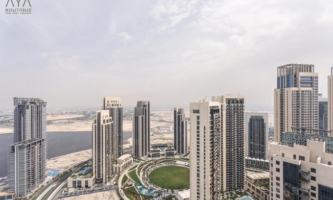 Dubai Apartment | Elegant Luxury Apartment with Stunning Lake Views in Dubai Creek Harbour By ĀYA Boutique