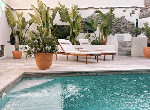 Melegis Hotel | Elysium Luxury Stays