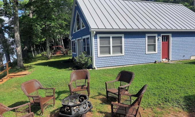 Smithfield Cabin | Enjoy amazing sunsets while steps from North Pond in this cozy 3-bedroom camp.