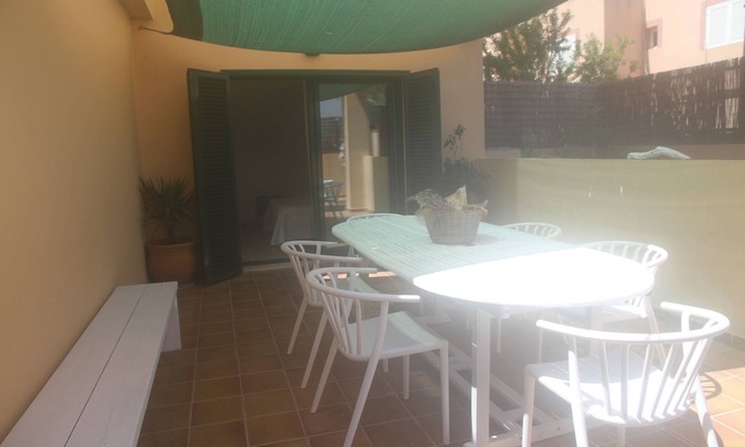 Es Pujols Apartment | Estany Ground floor with large terraces 2 minutes from the beach and the center on foot.
