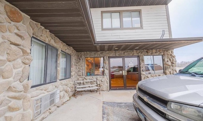 Harlan Hotel | Explore Prairie Rose, Pet Friendly Unit Stay w/Parking Included