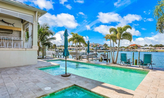 Island Estate House | Exquisite Clearwater Retreat w/Heated Pool, Game Room, Outdoor kitchen &Kayaks