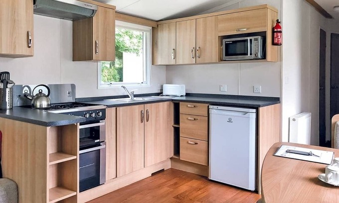 Saint Ann's Chapel House | Extra spacious luxury 12ft-wide caravan with one double and one twin.