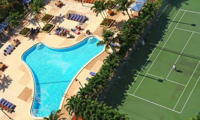 Sunny Isles Beach Condo | F-302 - Beautiful view of pool and gardens! Walk to beach!