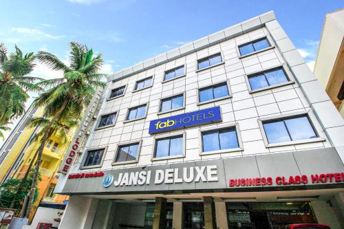Gandhipuram Hotel | FabHotel Jansi Deluxe - Nr Gandhipuram Bus stand