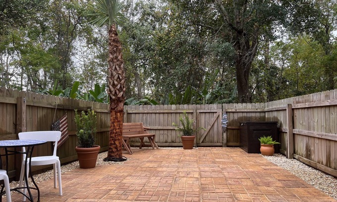 Pensacola Condo | Family Friendly Condo minutes to beach w/large pool and private outdoor space.
