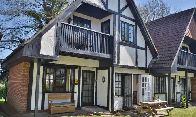 Saint Erth Praze Cottage | Farmland views to the rear of the property, and located within the grounds of Tolroy Manor