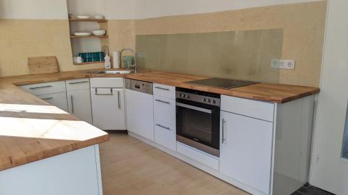 Birlenbach House | Ferienhäuschen mit Hof in Birlenbach