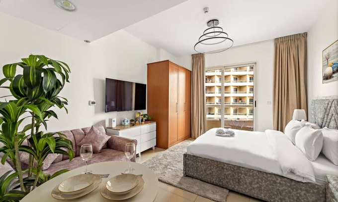 Dubai Production City Apartment | FIRST CLASS | Studio | Cozy & Chic Retreat