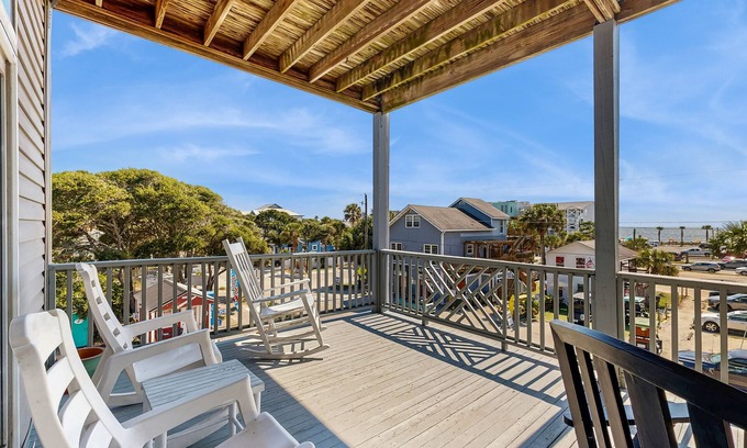 Folly Beach Condo | First-floor villa w/partial ocean views, covered porch -one block from the beach