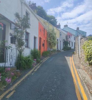 Mumbles House | Fishermen's cottage with log burner, 2 bathrooms & sea views from garden terraces