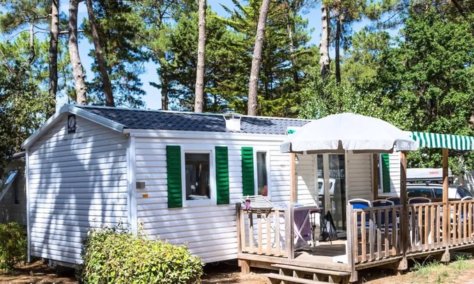 Les Conches House | Flower Camping Les Dunes * - Mobil Home Comfort 24m2 - 2 bedrooms - Small terrace + TV 4 persons