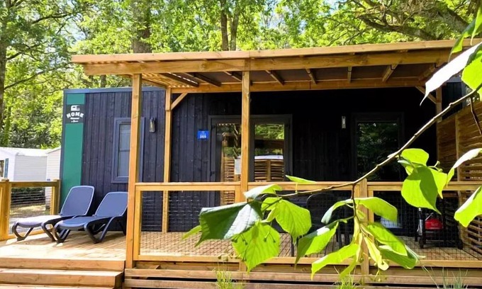 Les Conches House | Flower Camping Les Dunes * - Homeflower Premium CLIM 26.5m2 (2 bedrooms) + semi-covered terrace + TV + sheets + towels 4 people