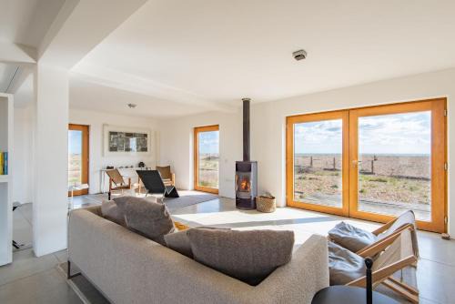Dungeness House | Fog Signal Building by Bloom Stays