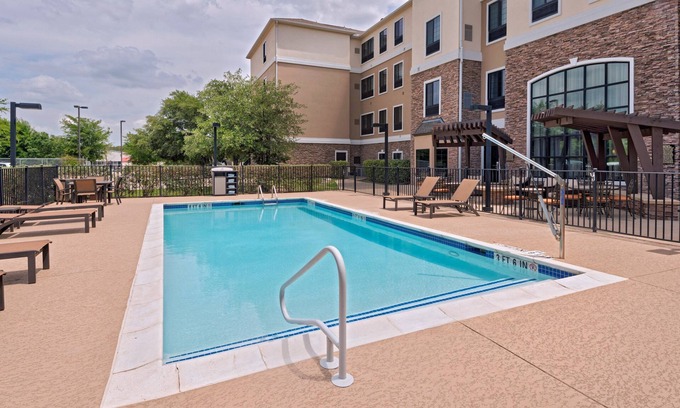 McNeil Apartment | Free Breakfast Buffet Included! Gym, Business Center, Pool Access.