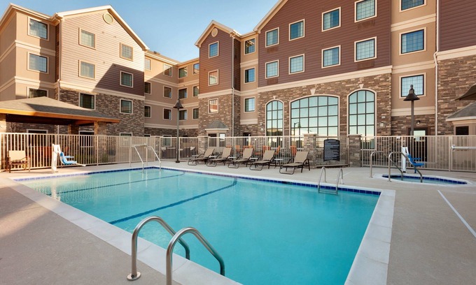 Midland Condo | Free Breakfast. Pool. Quick Drive to the new Chevron and Oxy campuses! Great for Business Travelers!