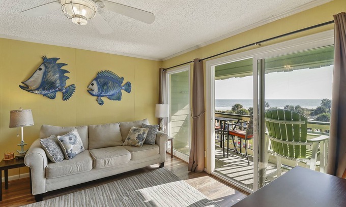 Isle of Palms Condo | Front beach sea cabin with amazing view, pool access, beach access, and pier!