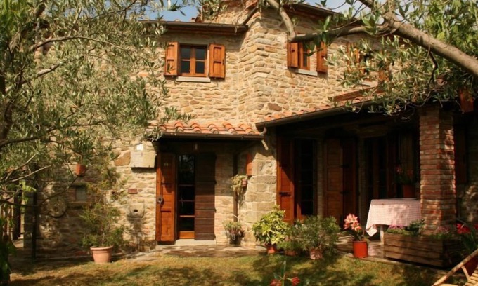 Montecchio Villa | Fully detached and fenced stone cottage with an outside porch. Garden equipped with table, chairs, d