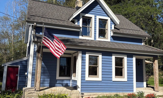 Saukville House | Fully restored 1855 Log Cabin, a modern-rustic retreat