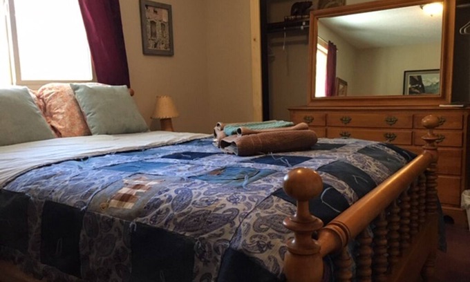 Woodland Park Bed & Breakfast | Furnished bedroom in our Home with full size bed, shared bath
