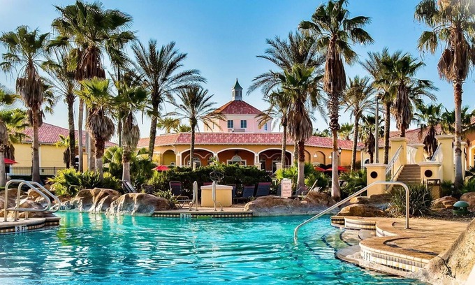 Regal Palms Villa | Gated Tropical Water Park Resort, lazy river, water slide, heated pools & more