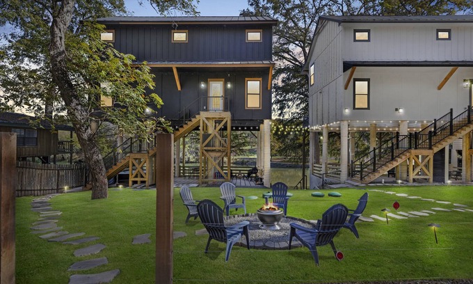 New Braunfels House | Gather, relax, and explore the river. Two side-by-side homes with space for 22 guests, hot tub under the stars, arcade fun, and peaceful water views.