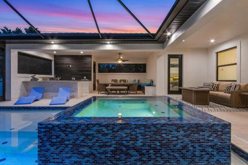 Pelican House | Gorgeous! Heated, Saltwater Pool and Spa, Custom Outdoor Kitchen - Villa Still Waters - Roelens