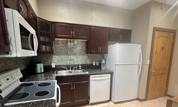 Corcoran Apartment | Gorgeous & Luxurious Lower Unit with Patio and Firepit