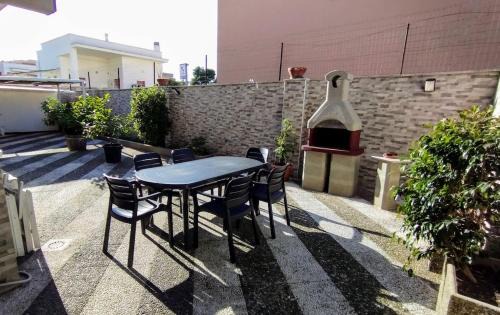 Lizzano Apartment | Grande Bilocale con giardino