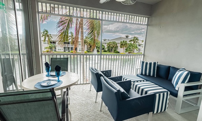 Naples Condo | GreenLinks/Lely: Newly Updated decorated Condo with den, workspace, large smart TV's & lanai seating